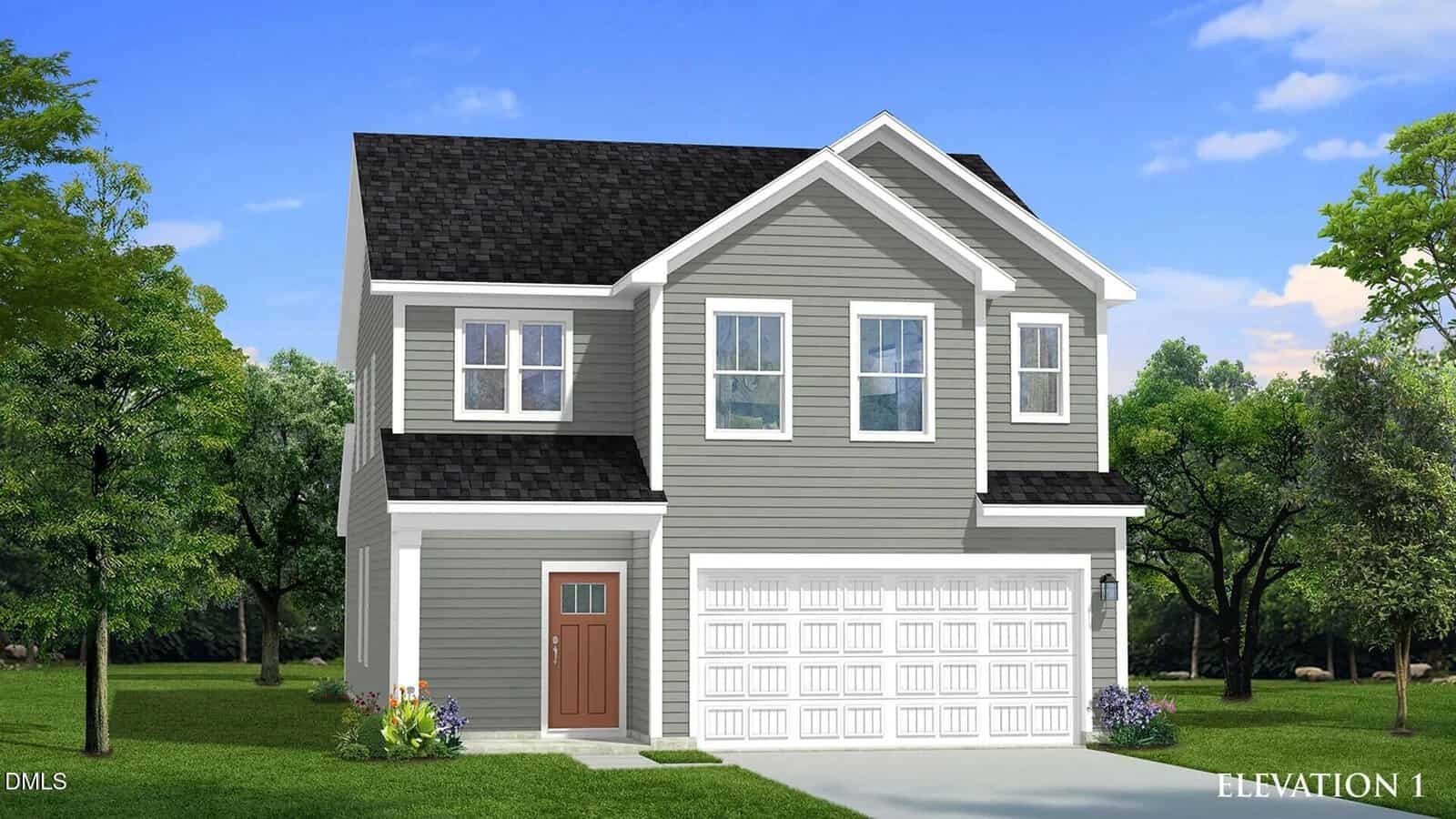 This charming two-story gray house with white trim is located at 38 Gerrard Street in Franklinton. It features a spacious two-car garage, a striking red front door, and windows on both floors. The property is surrounded by lush grass, small shrubs, and trees under a blue sky with a few clouds.