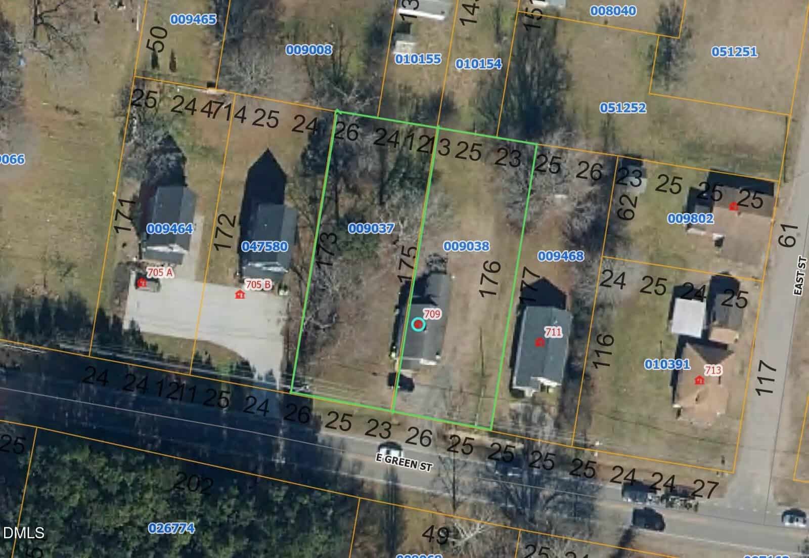Aerial view of a residential neighborhood in Franklinton with lot boundaries and numbers overlaid, showing three houses on green-bordered lots along 709 E Green Street, surrounded by other numbered properties and trees.