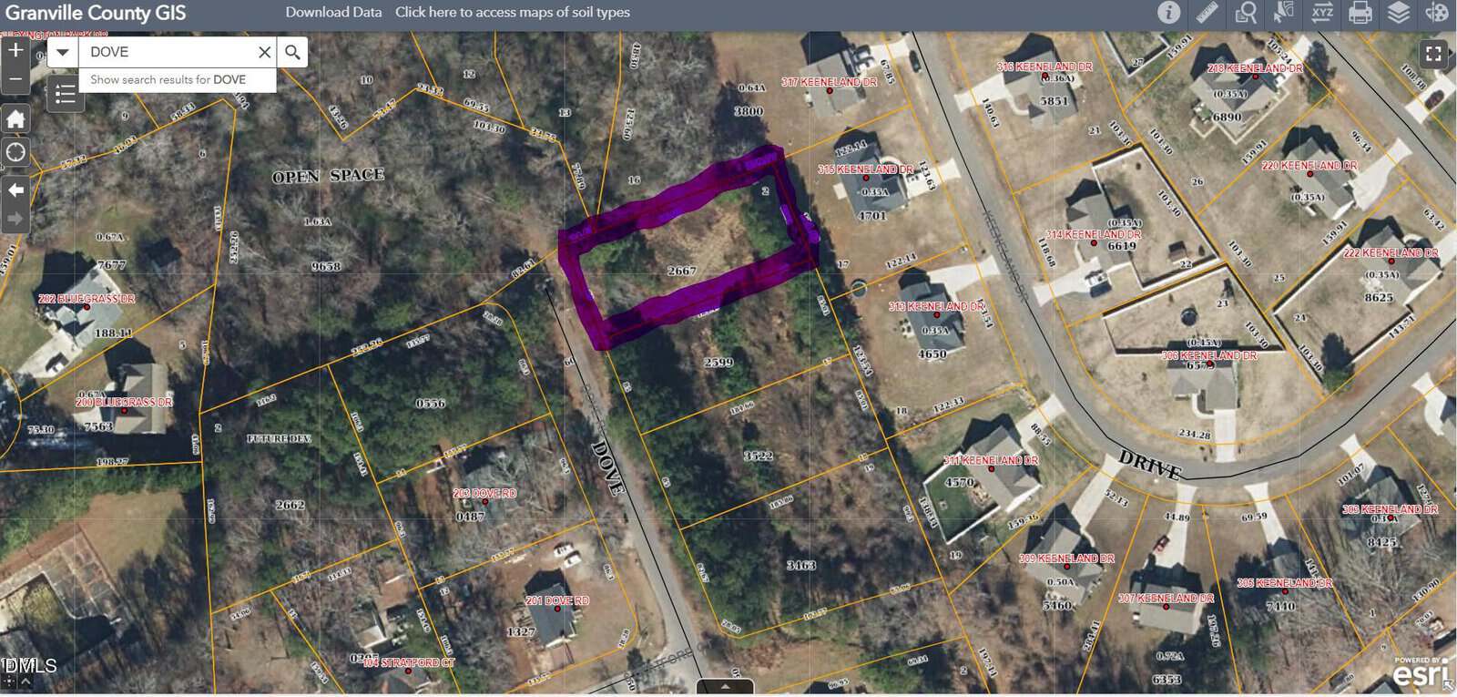 Aerial map of Granville County GIS showing a residential area with property boundaries. The search for "Dove" highlights Lot 16 Dove Road in purple near Oxford, surrounded by trees and neighboring homes.