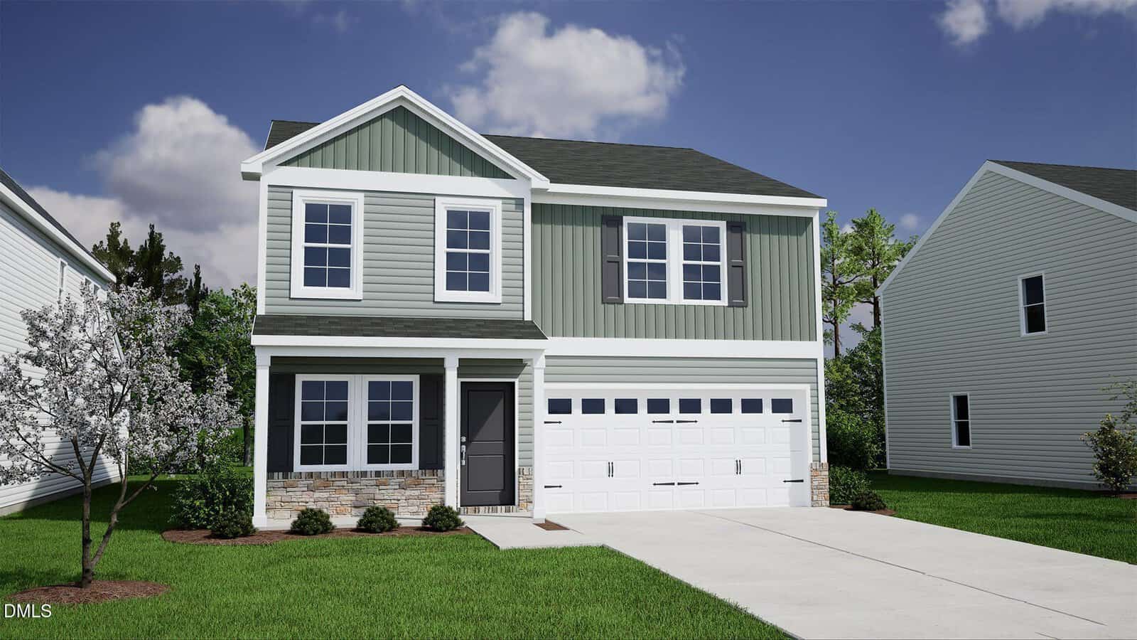 Charming two-story suburban house at 32 Plantation Drive, Youngsville, with green and white siding, a double garage, front porch, and a small landscaped yard featuring grass, bushes, and a tree beneath a blue sky with scattered clouds.