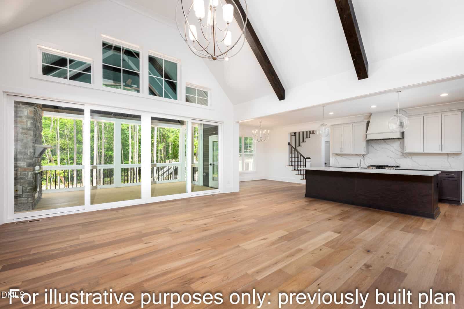 Spacious, modern open-concept living area with wood floors, large windows, vaulted ceiling with beams, chandelier, white kitchen with island, and view of a screened porch. Text reads, “For illustrative purposes only: previously built plan.”.