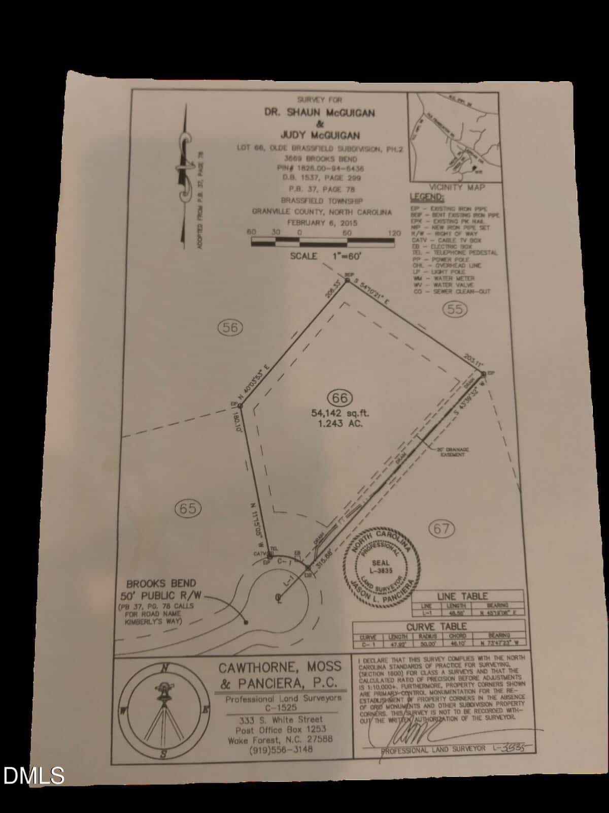 A survey map for Dr. Shaun McGuigan and Judy McGuigan shows Lot 66 in Brooks Bend, North Carolina, with property boundaries, measurements, labels, and a certification section.