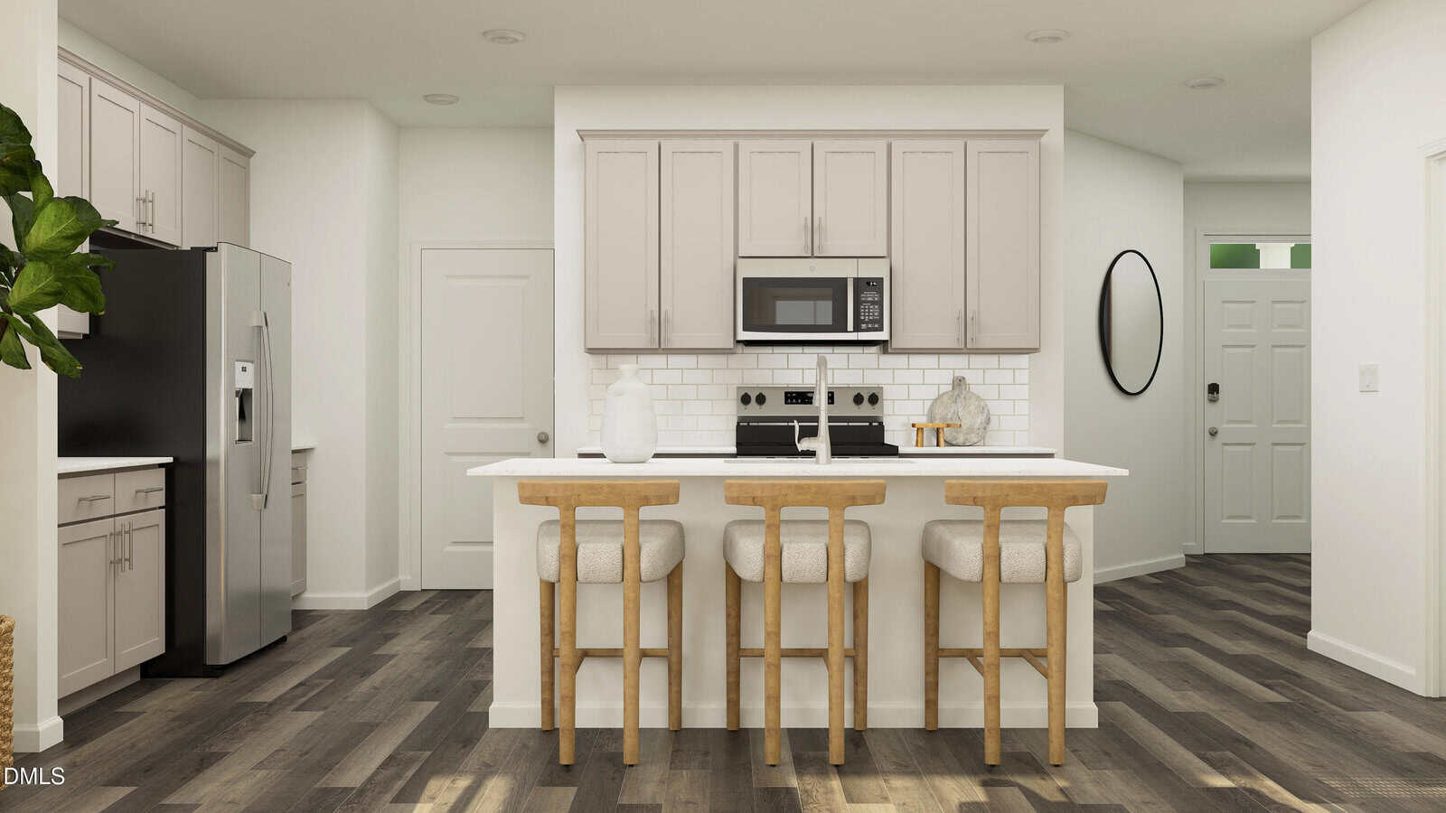 Modern kitchen with white cabinets, a central island with three wooden barstools, stainless steel appliances, white subway tile backsplash, and dark wood flooring. An entryway with a round mirror is visible in the background.