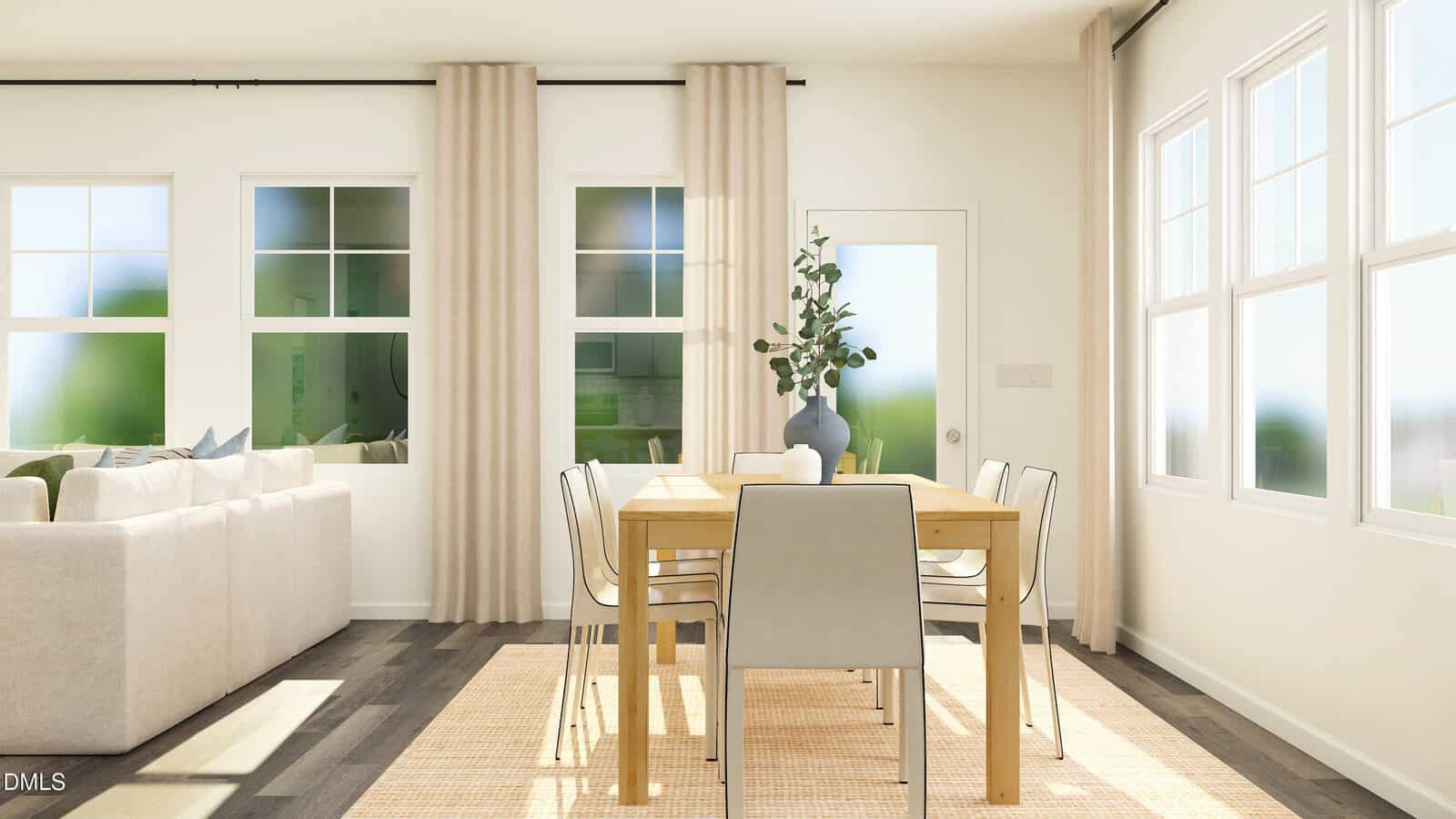 Bright dining area with a wooden table, six chairs, beige curtains, large windows, and a potted plant centerpiece. Adjacent to a cozy living room with a light-colored sectional sofa.