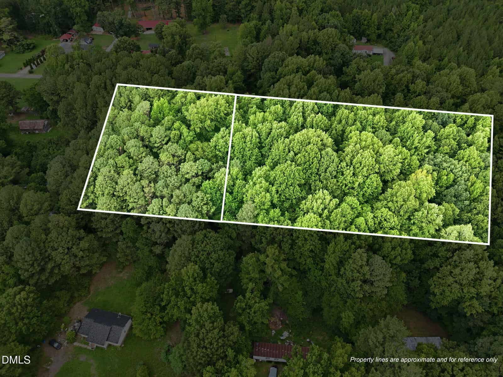 Aerial view of a wooded area with two rectangular plots outlined in white, surrounded by trees and a few houses visible at the edges.