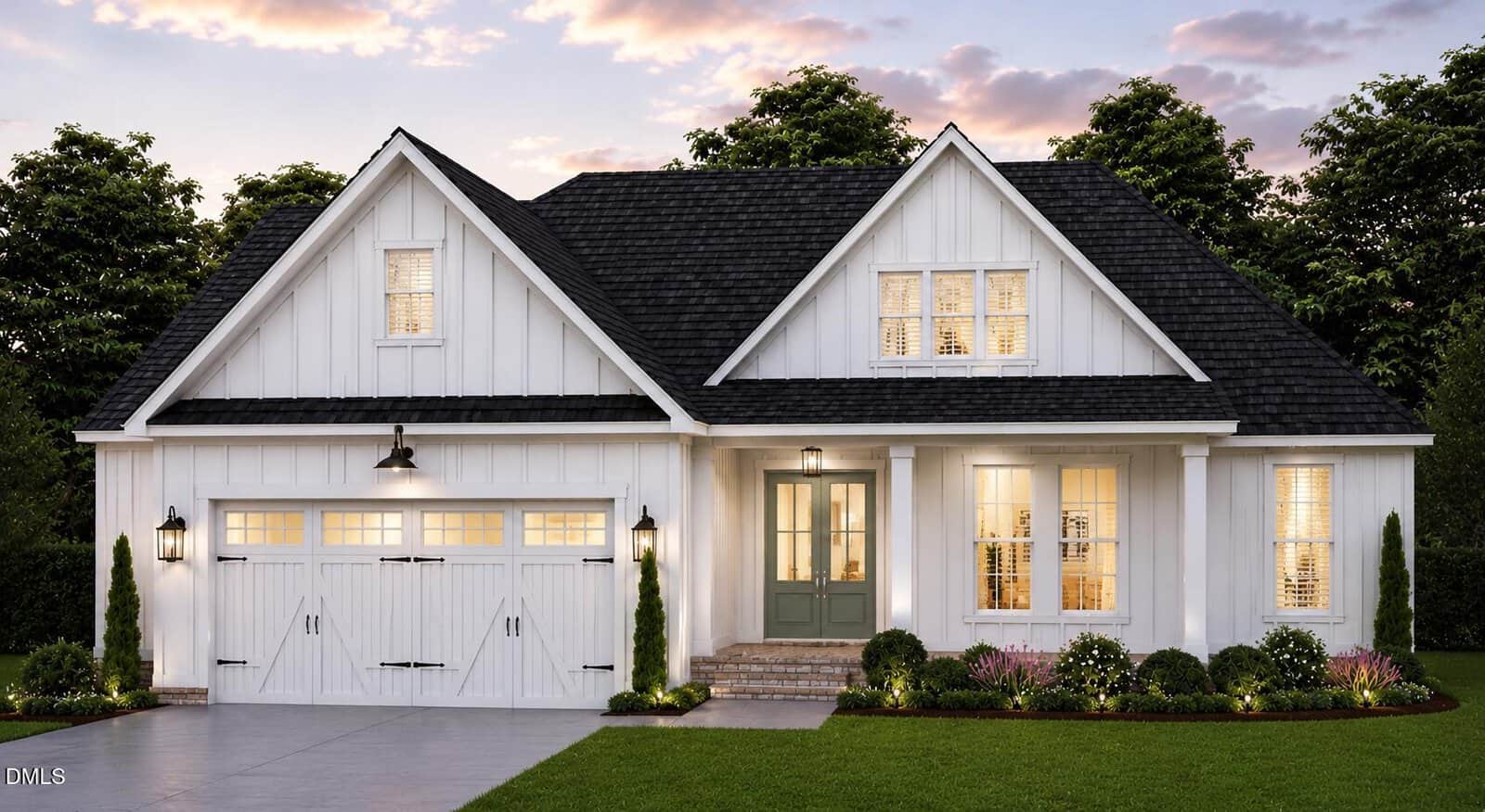 A white single-story house with a black roof, double garage doors, front porch with columns, green front door, and lit windows sits beautifully at 109 Spring Grove Drive in Oxford. The yard is landscaped with grass, bushes, and flowers. Trees and a cloudy sky are in the background.