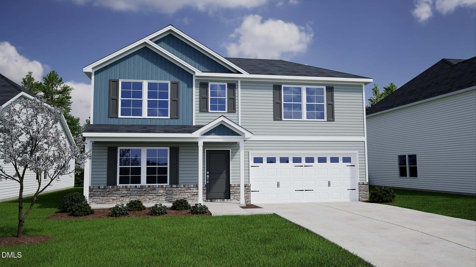 Two-story modern house with blue and gray siding, large windows, and a white two-car garage located at 9 Mistflower Drive in Youngsville. A small tree and landscaped shrubs are in the front yard, with a concrete driveway leading to the garage.