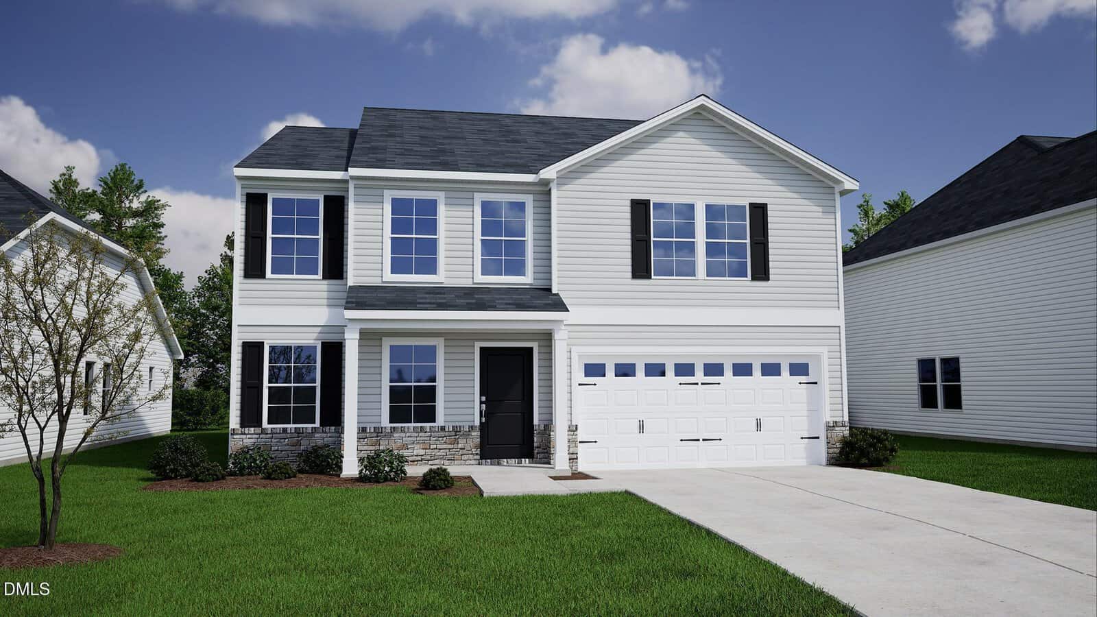 This charming two-story white house at 17 Mistflower Drive in Youngsville features black shutters, a dark front door, and a spacious two-car garage. The inviting front yard boasts green grass, a small tree, and well-kept shrubs, set beneath a blue sky dotted with a few clouds.