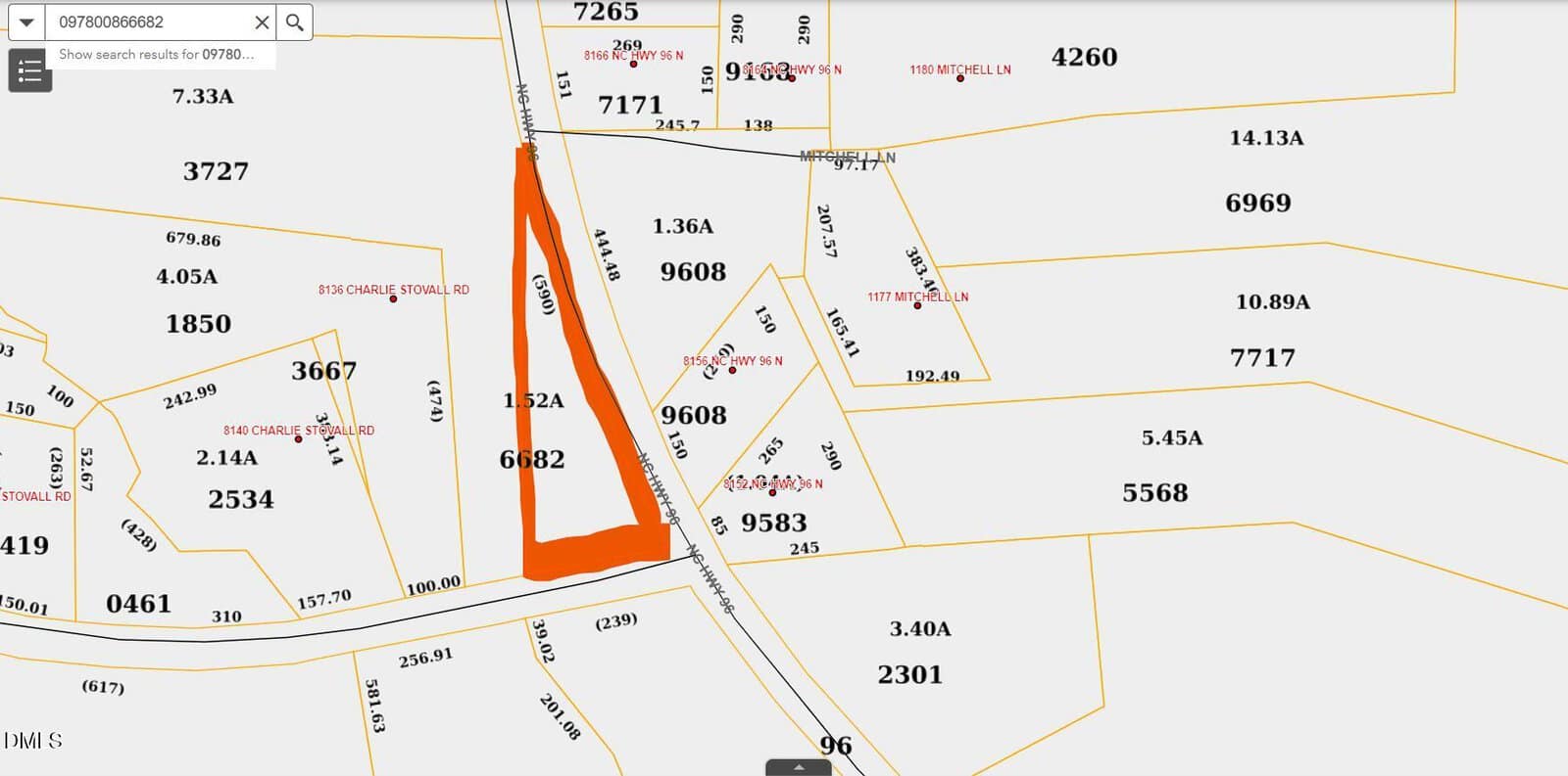 A property map highlights parcel 6822 in orange. Surrounding parcels have black numbers and yellow outlines. Roads and nearby parcel numbers are labeled. The map is a digital property boundary layout.