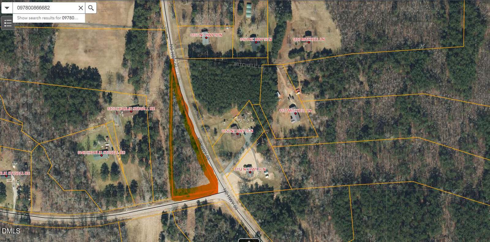 Aerial view of a rural area in Oxford showing property lines, parcels labeled with ID numbers—including Lot 5 Hwy 96 N—and a highlighted triangular plot near intersecting roads, surrounded by trees and open fields.
