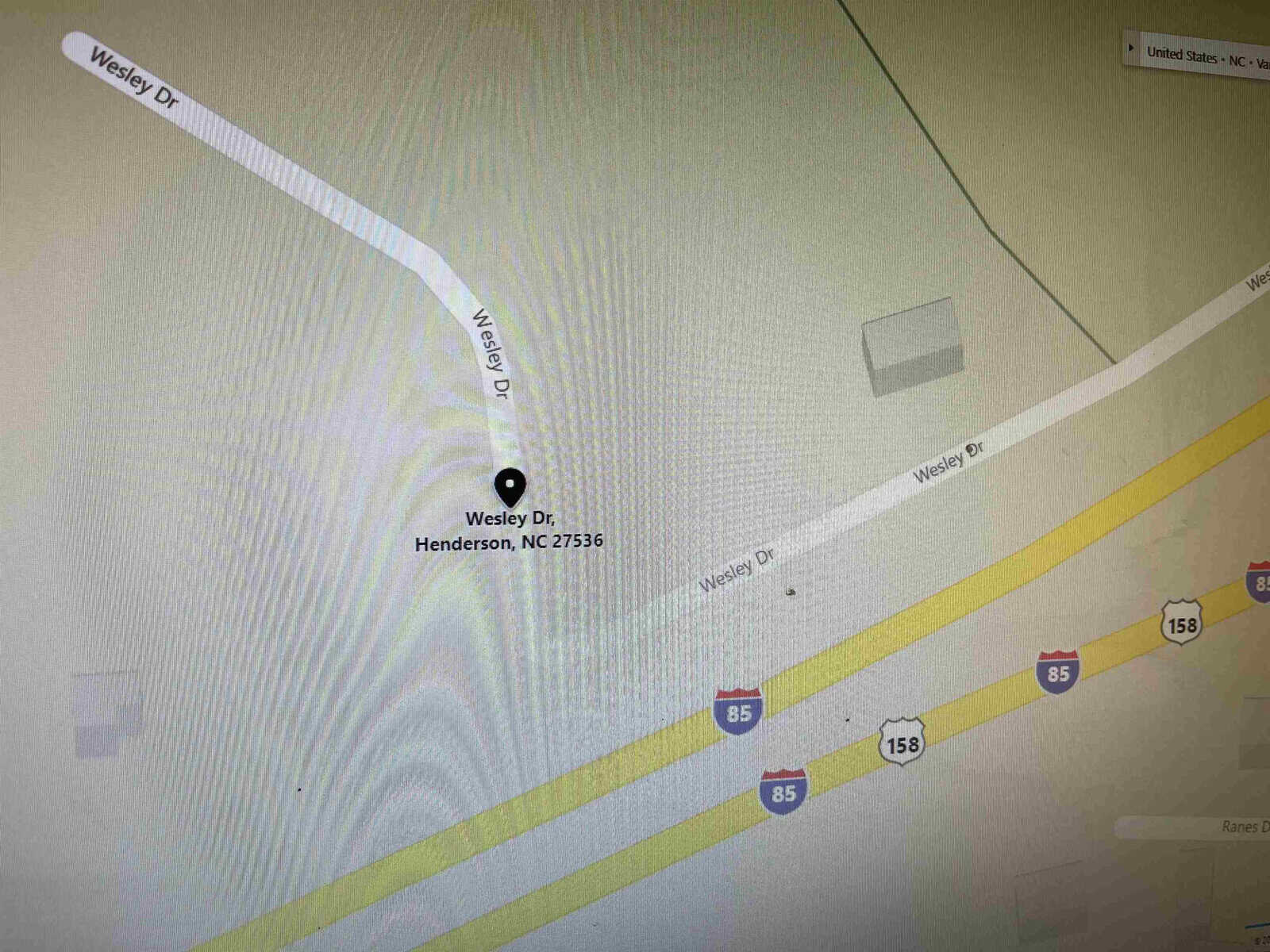 Map view of a street intersection, with wesley dr. highlighted, located in henderson, nc 27536, near highway i-85.