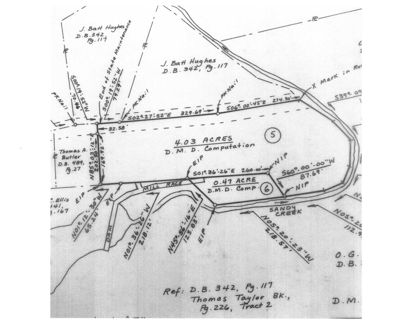 A black and white image of a land survey diagram, detailing specific plots of land with boundary measurements and acreage, intersected by a winding creek named sandy creek.