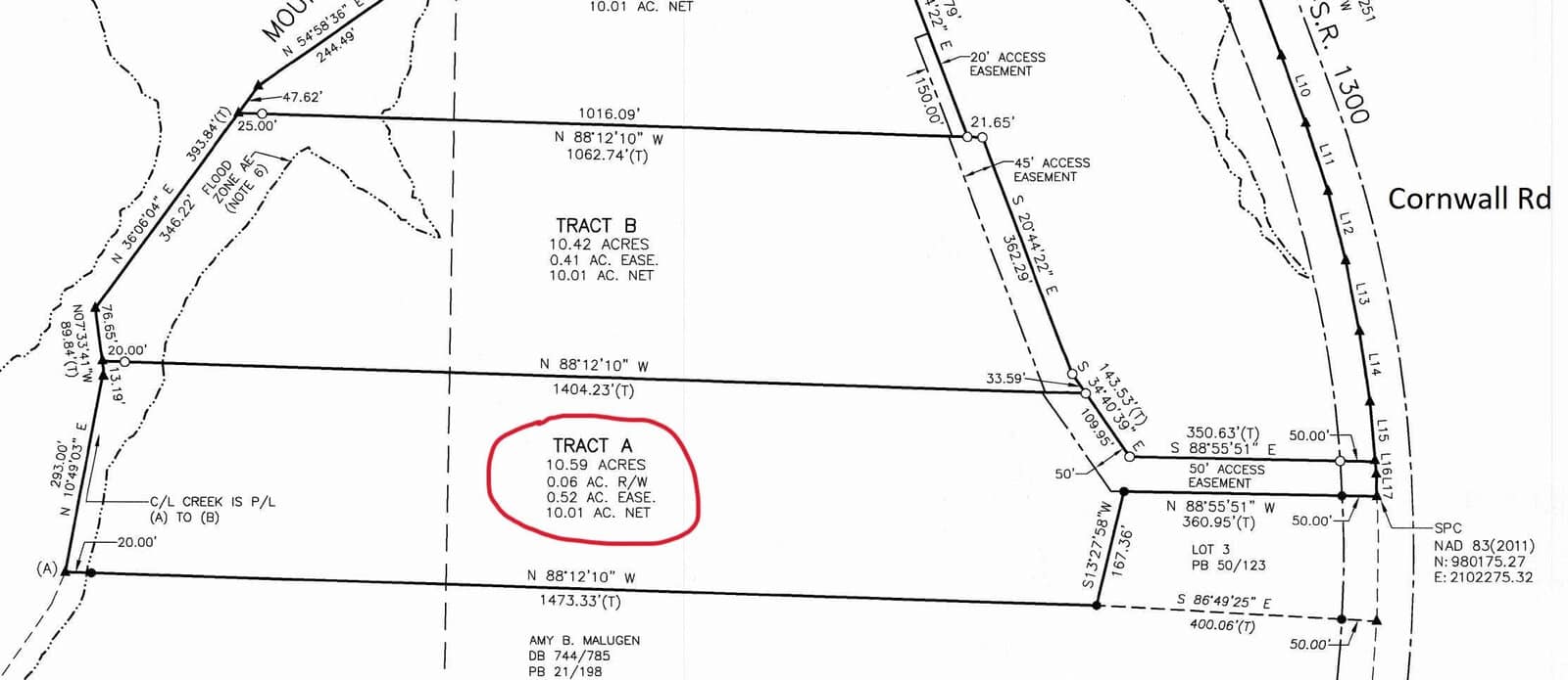 A black and white survey map highlighting an area labeled "Tract A" in red. It shows property boundaries, measurements, and includes roads, such as Cornwall Rd, along with various technical details and coordinates.