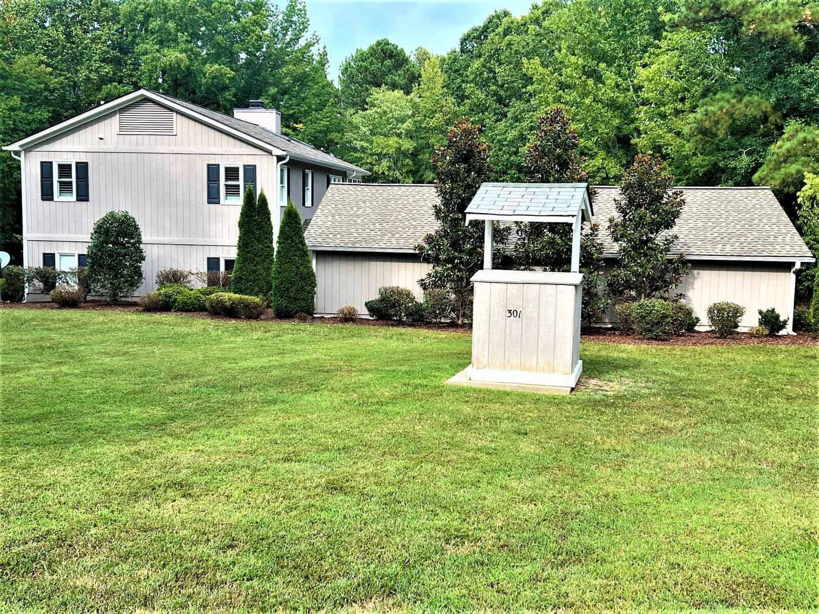 A well in a yard located at 301 Pebble Hill Lane, Henderson NC.